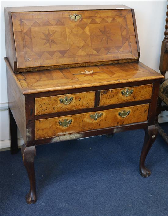 An oak, walnut and parquetry bureau, 18th century, w.79cm